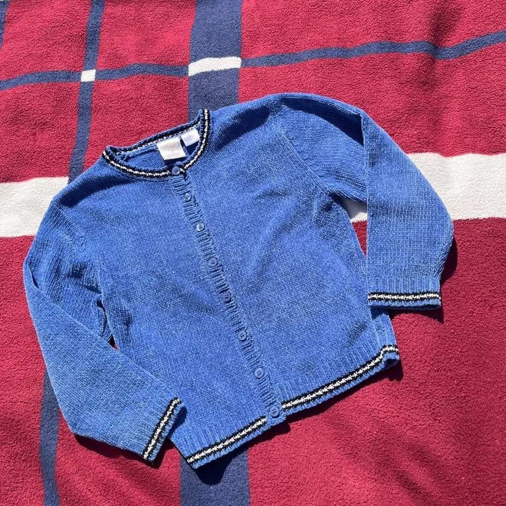 Blue button up cardigan sweater
Vintage Spumoni
Kids M medium 5/6
100% polyester